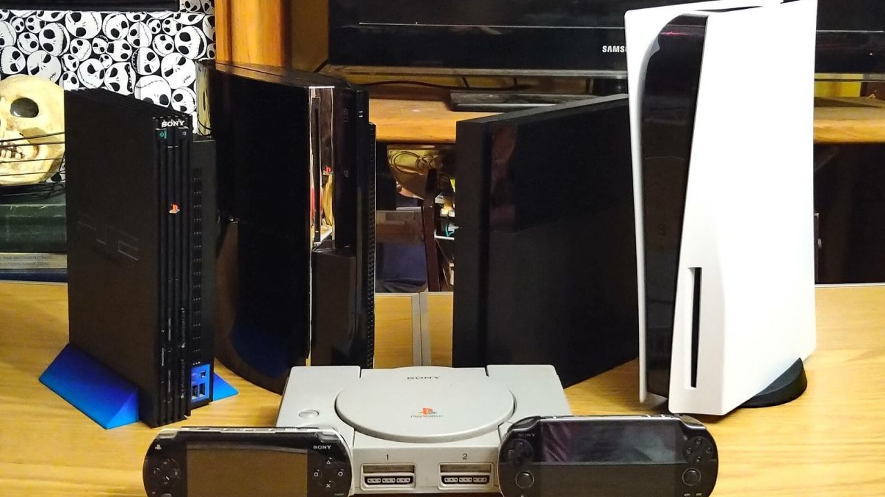 PS1, PS2, PS3, PS4 and PS5 consoles lined up together with a PSP and PS Vita in front