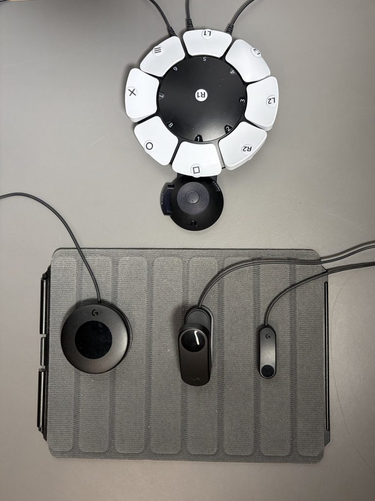 Sony Access controller with round button layout connected to accessory switches